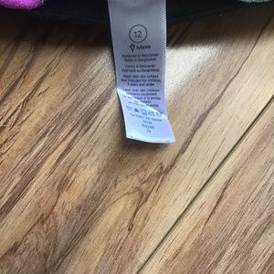 Ivivvia black leggings with color around waist.